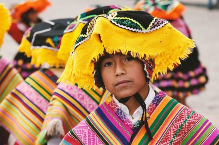 boy in colourful traditional dress Peru