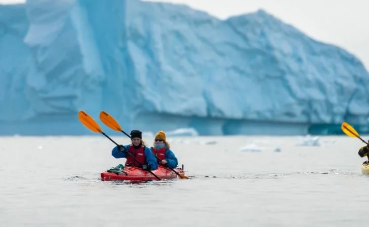 kayakers on the frozen continent